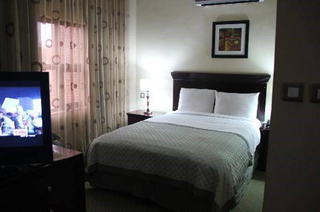 Denis Hotel Abuja Mobushipe Room photo